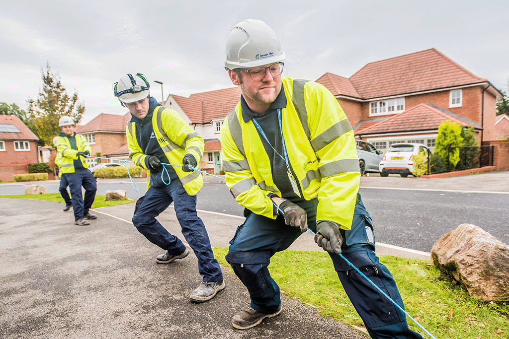 Jurassic Fibre construction team installing broadband in a street in Devon