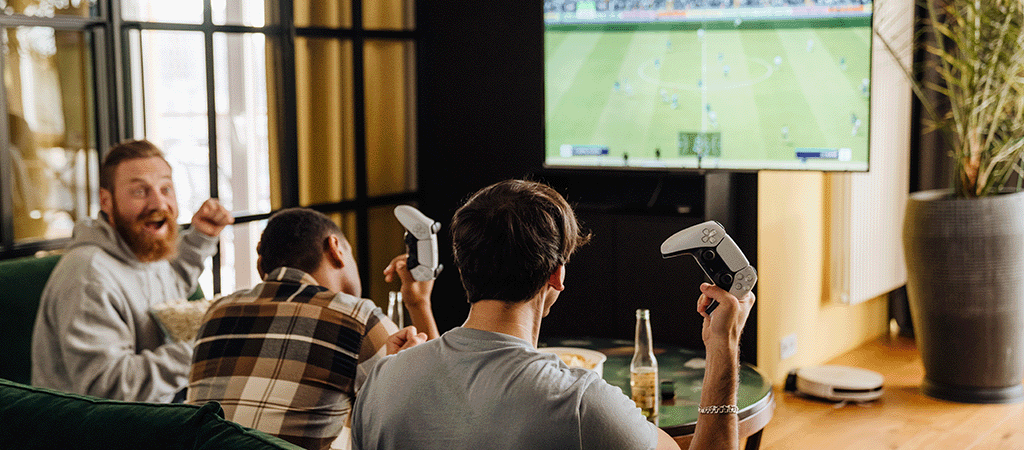 Friends-playing-football-in-their-flat