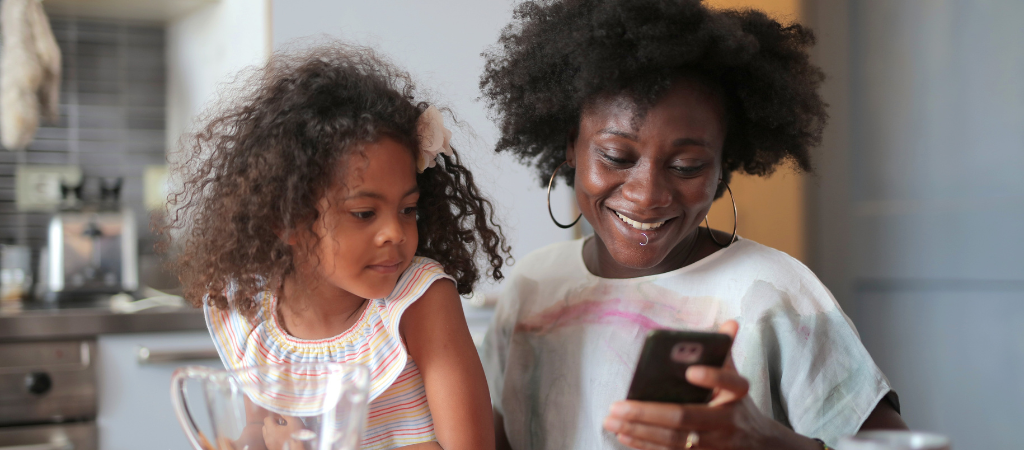 Mother and daughter on a smartphone